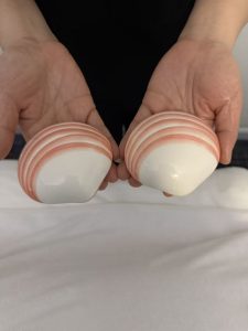 Warm lava shell massage tools at Shangrila Head Spa